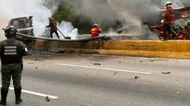 Venezuela roadway burns as vehicle hits crash site