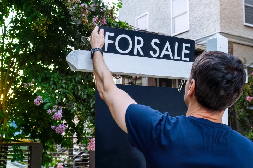 As home sellers must lower prices, reality hits